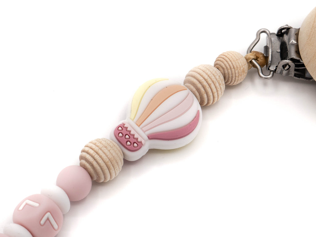 Handgefertigte und individuelle Schnullerkette rosa Ballon - Schnullerkettenwelt