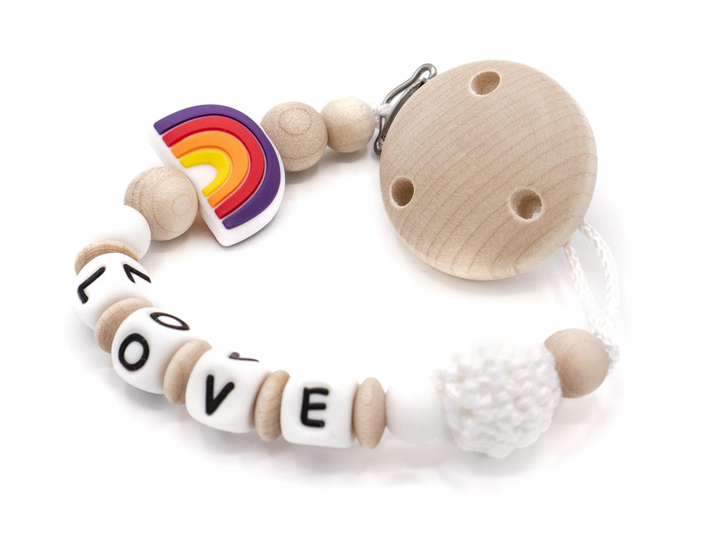 Handgefertigte und individuelle Schnullerkette bunter Regenbogen - Schnullerkettenwelt