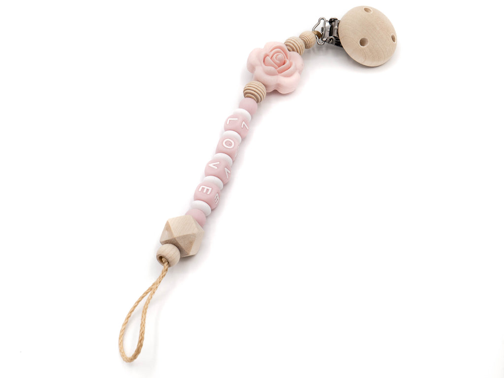 Handgefertigte und individuelle Schnullerkette rosa Rose - Schnullerkettenwelt