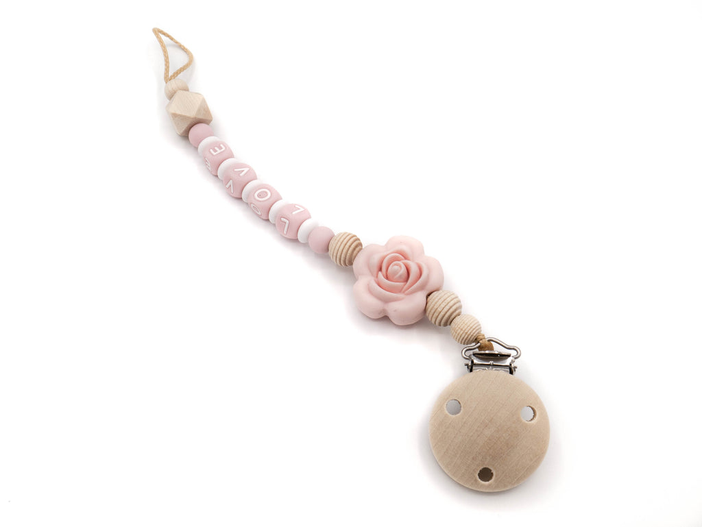 Handgefertigte und individuelle Schnullerkette rosa Rose - Schnullerkettenwelt