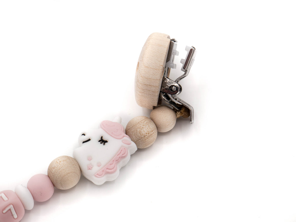 Handgefertigte und individuelle Schnullerkette rosa Einhorn - Schnullerkettenwelt