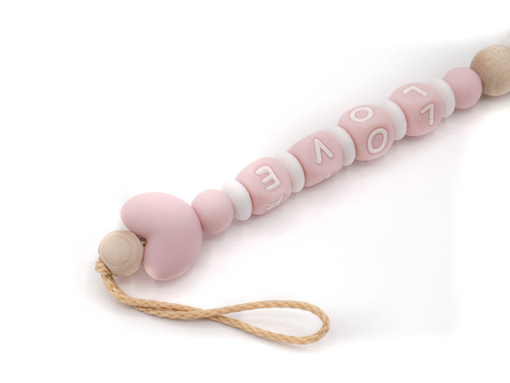 Handgefertigte und individuelle Schnullerkette rosa Einhorn - Schnullerkettenwelt