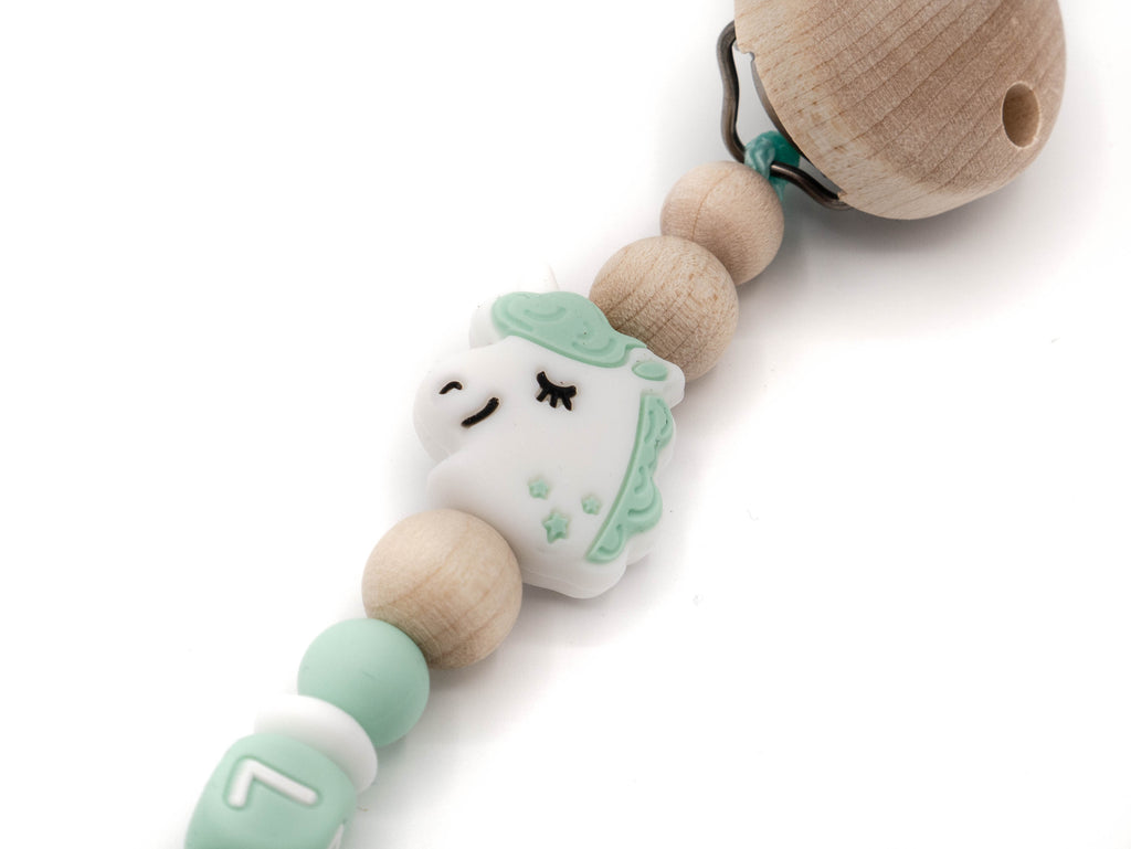 Handgefertigte und individuelle Schnullerkette mint Einhorn - Schnullerkettenwelt
