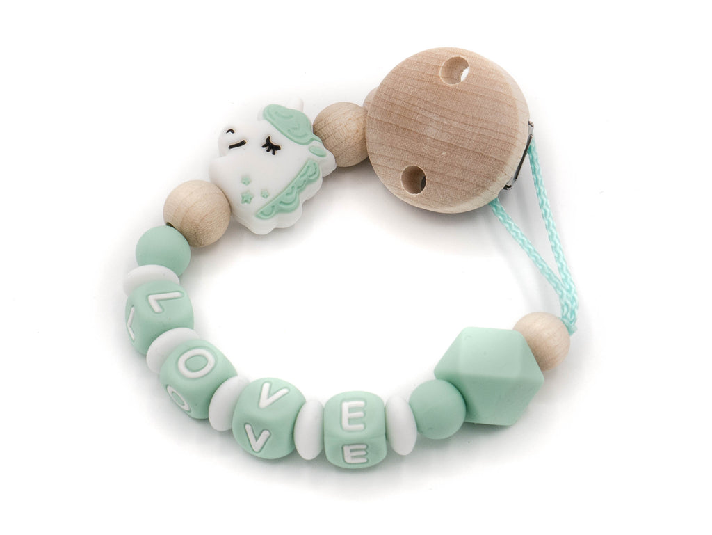 Handgefertigte und individuelle Schnullerkette mint Einhorn - Schnullerkettenwelt