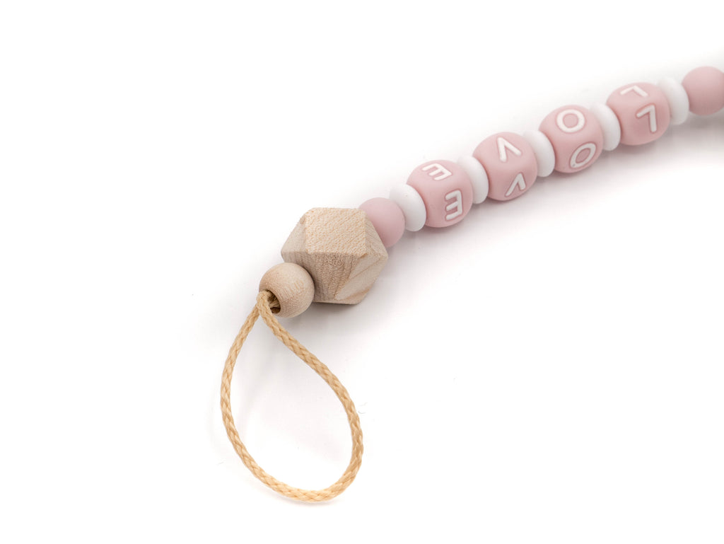 Handgefertigte und individuelle Schnullerkette rosa Ballon - Schnullerkettenwelt